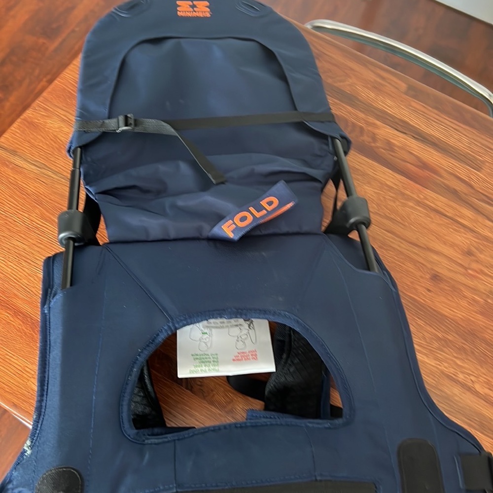 Child carrying shoulder back pack.. minimies brand